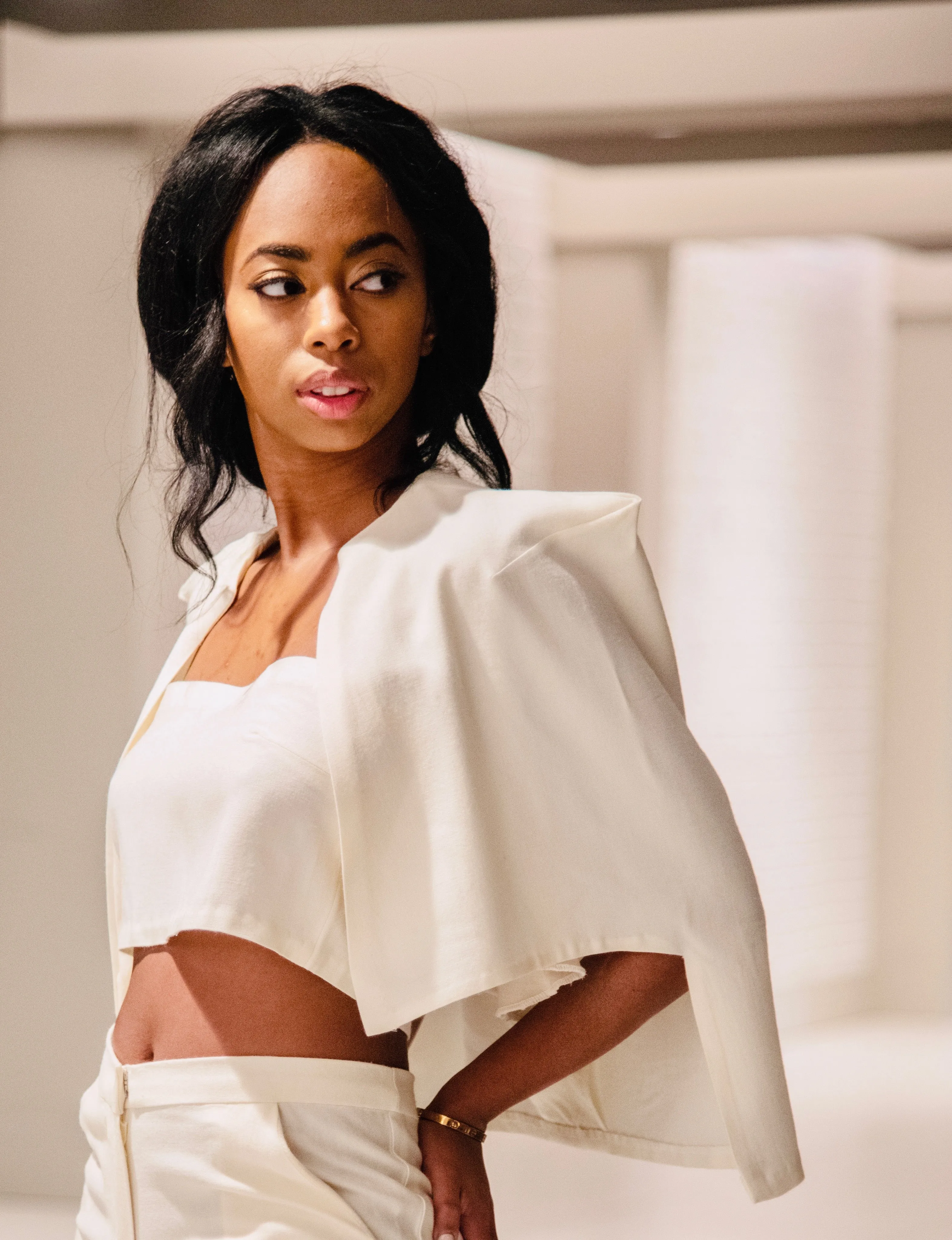 Cape Tied Tencel Cape, cropped top, and pants.